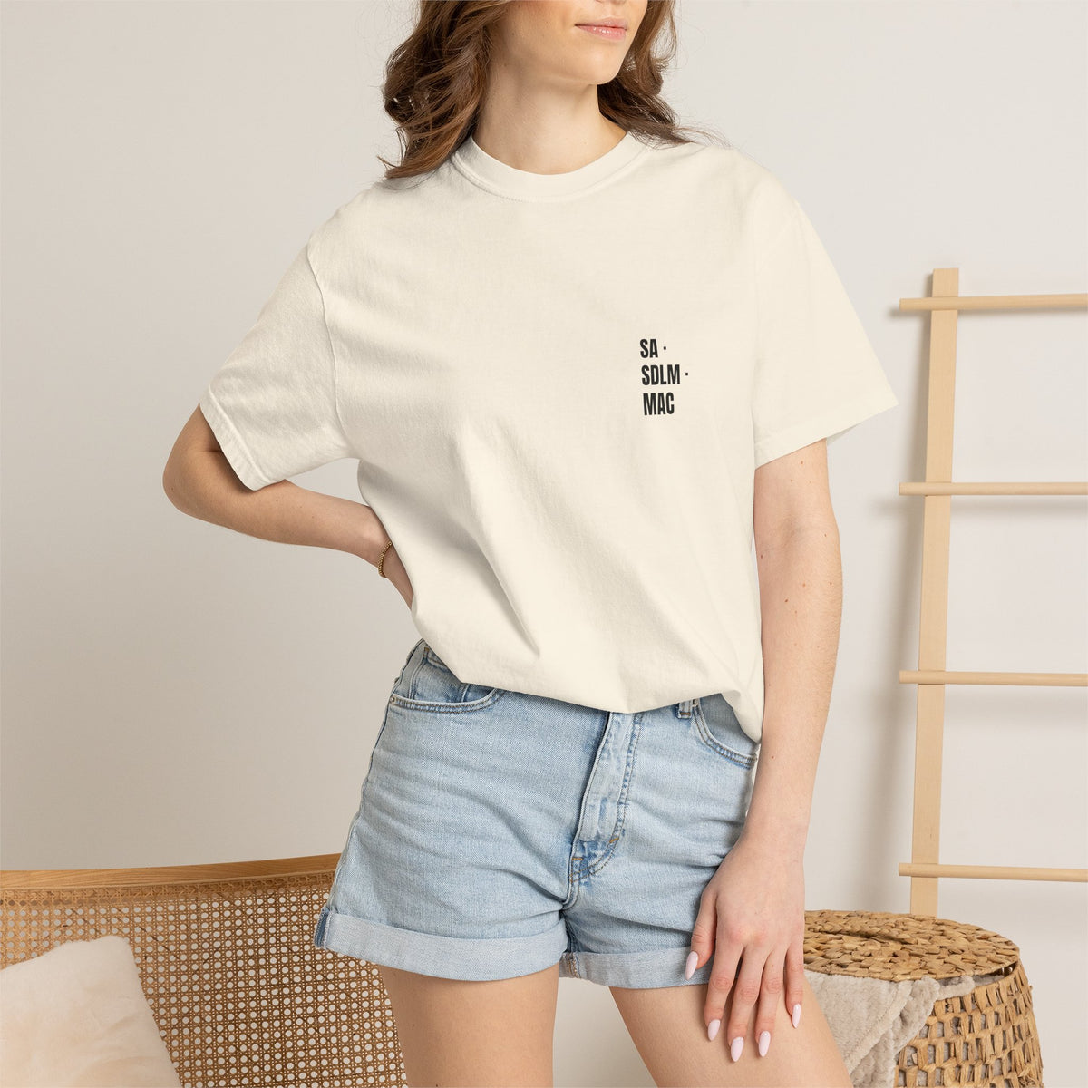 Model wearing the Ivory SA · SDLM · MAC Monogram Tee